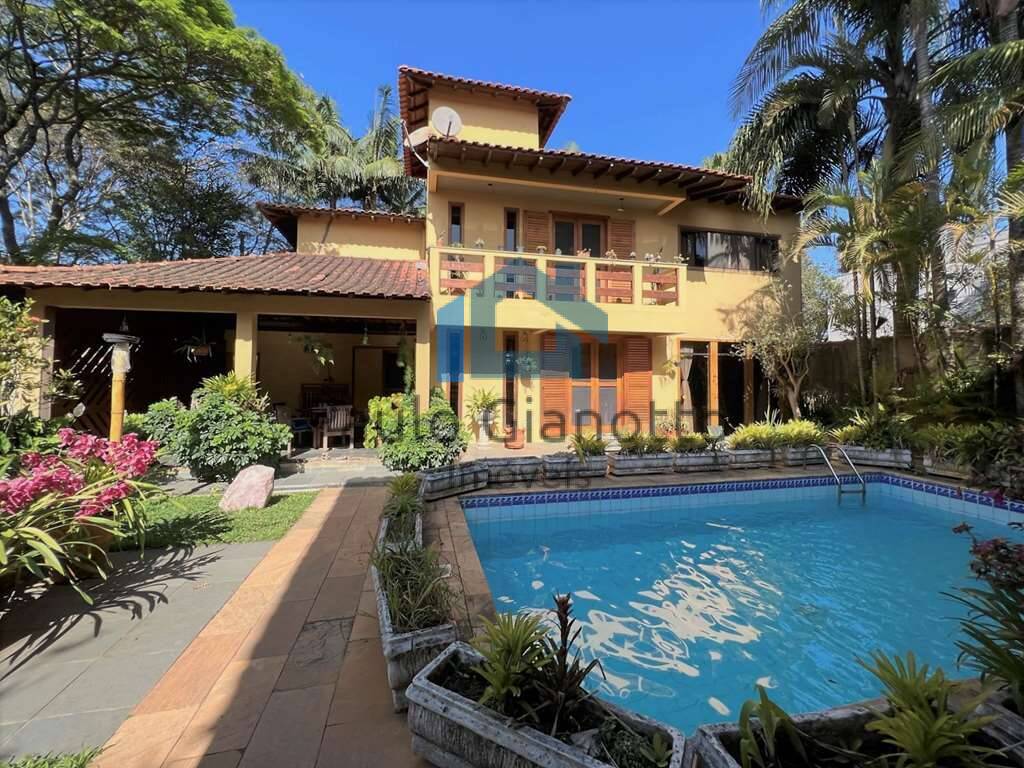 Casa de Condomínio à venda com 4 quartos, 342m² - Foto 1